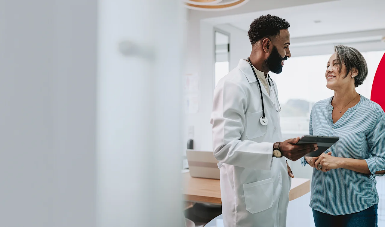 header-male-doctor-female-patient-smiling-t-t