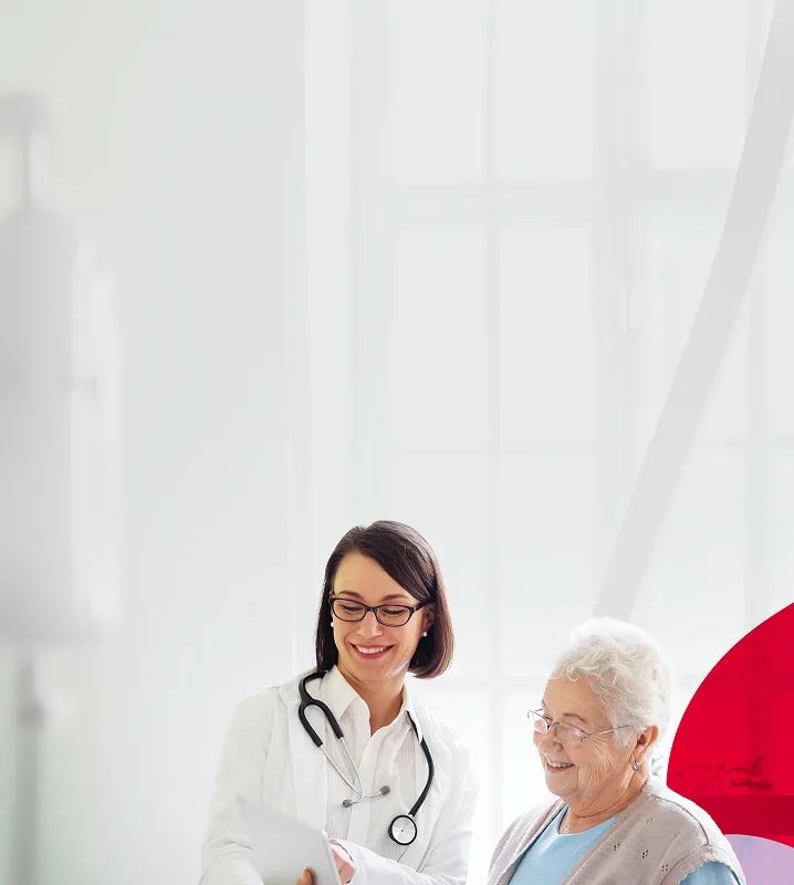 header-female-doctor-older-female-patient-m