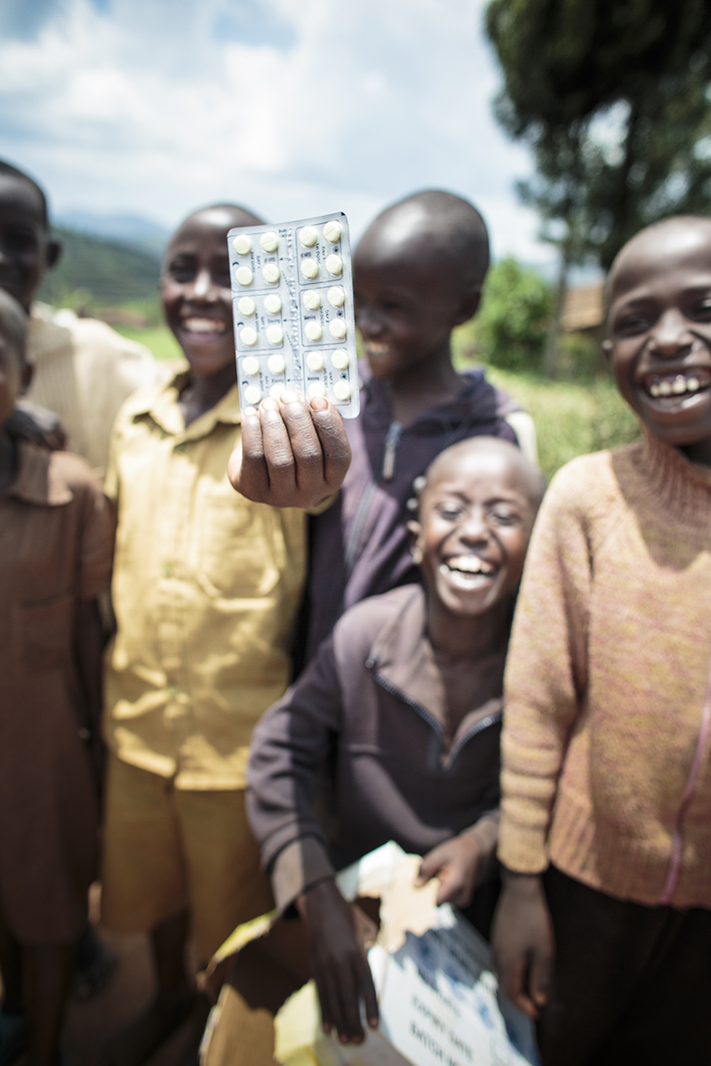 Boy with strip of pills 5.jpg