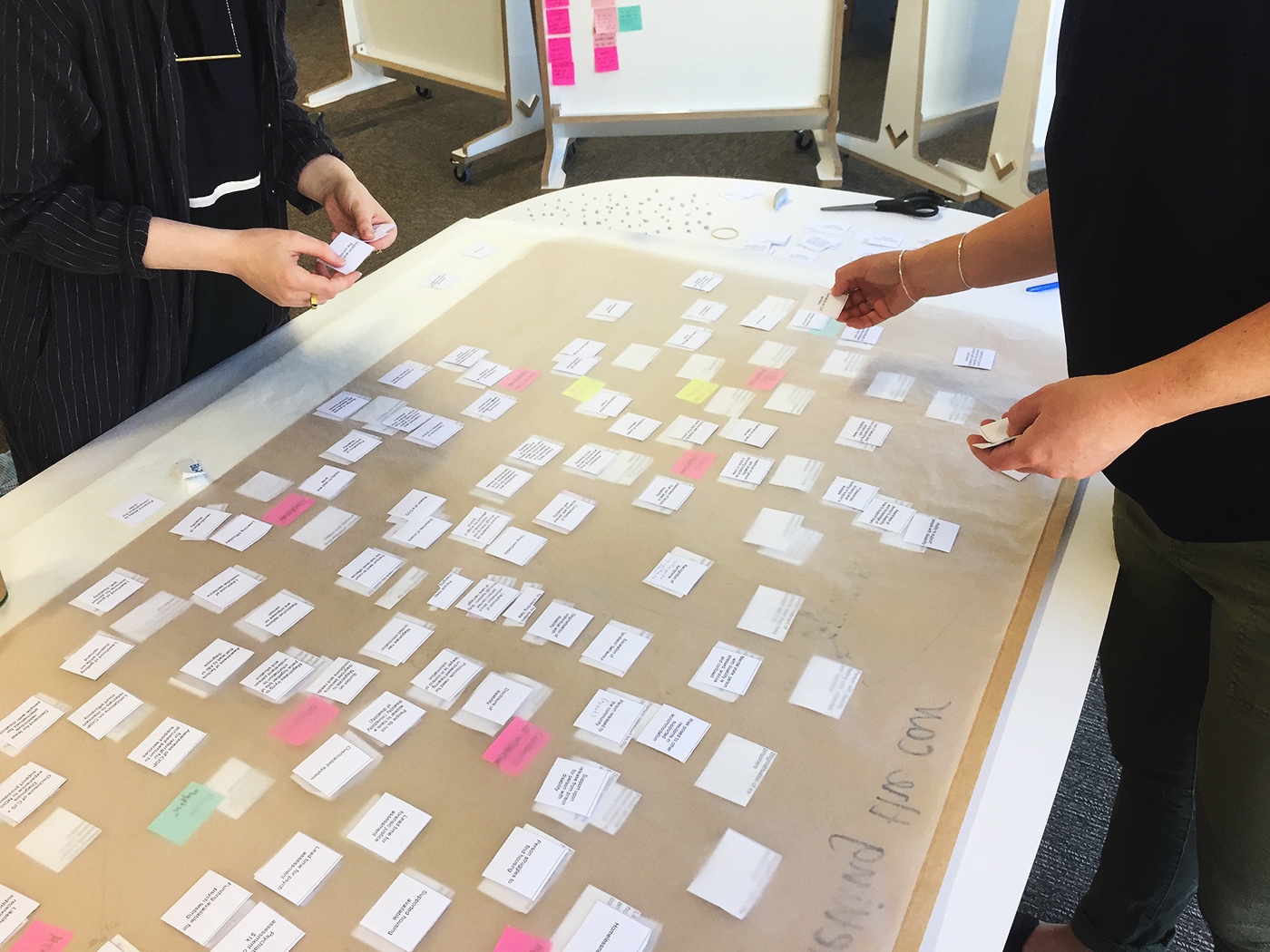 Participants in a CIJ workshop, mapping out a huge number of data points.