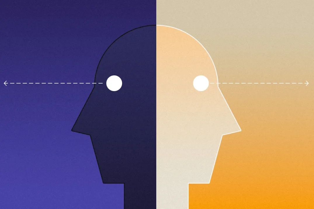 Two faces stand back to back, one looks backward, the other forward.