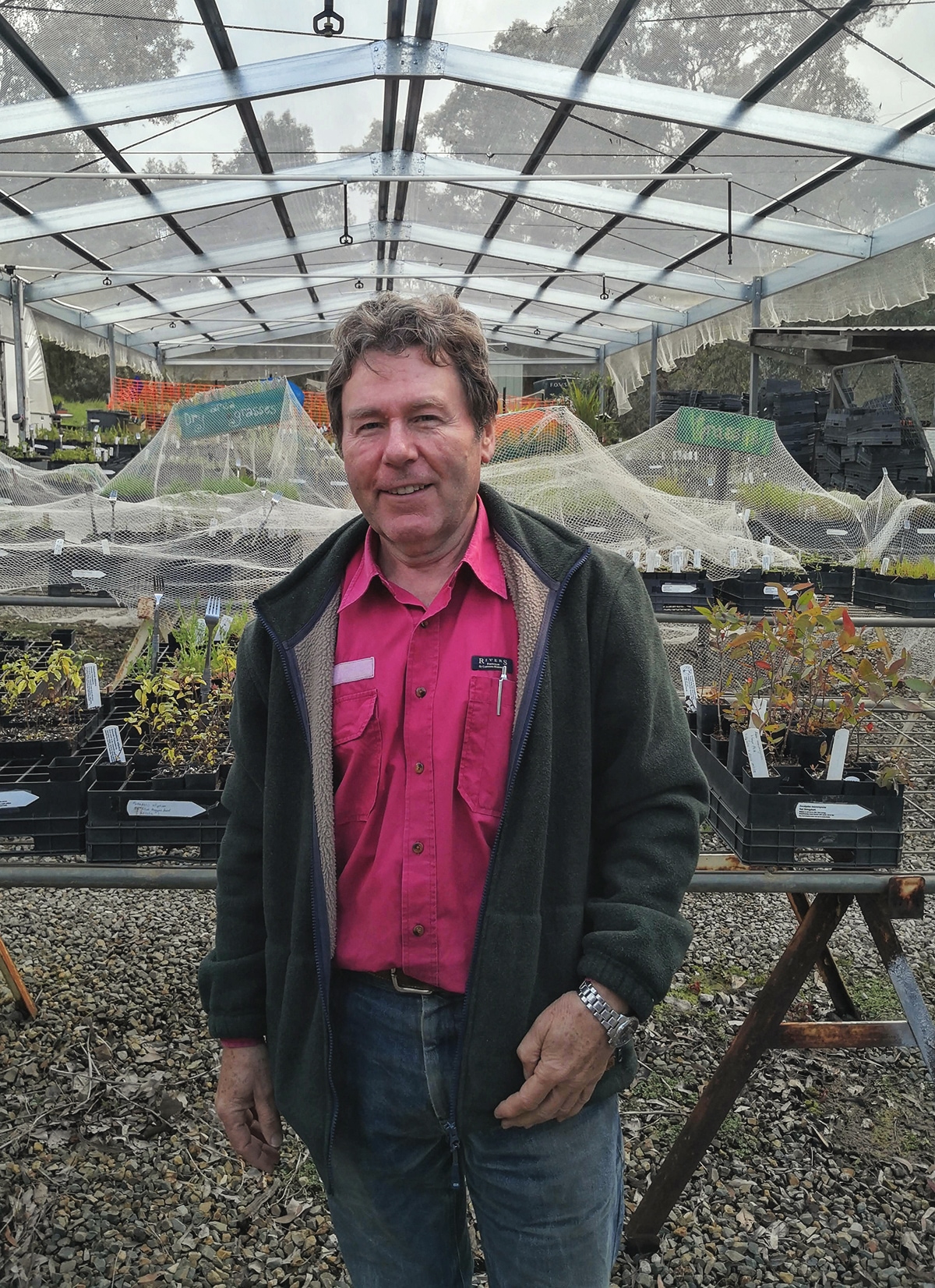 A conservationist in his greenhouse