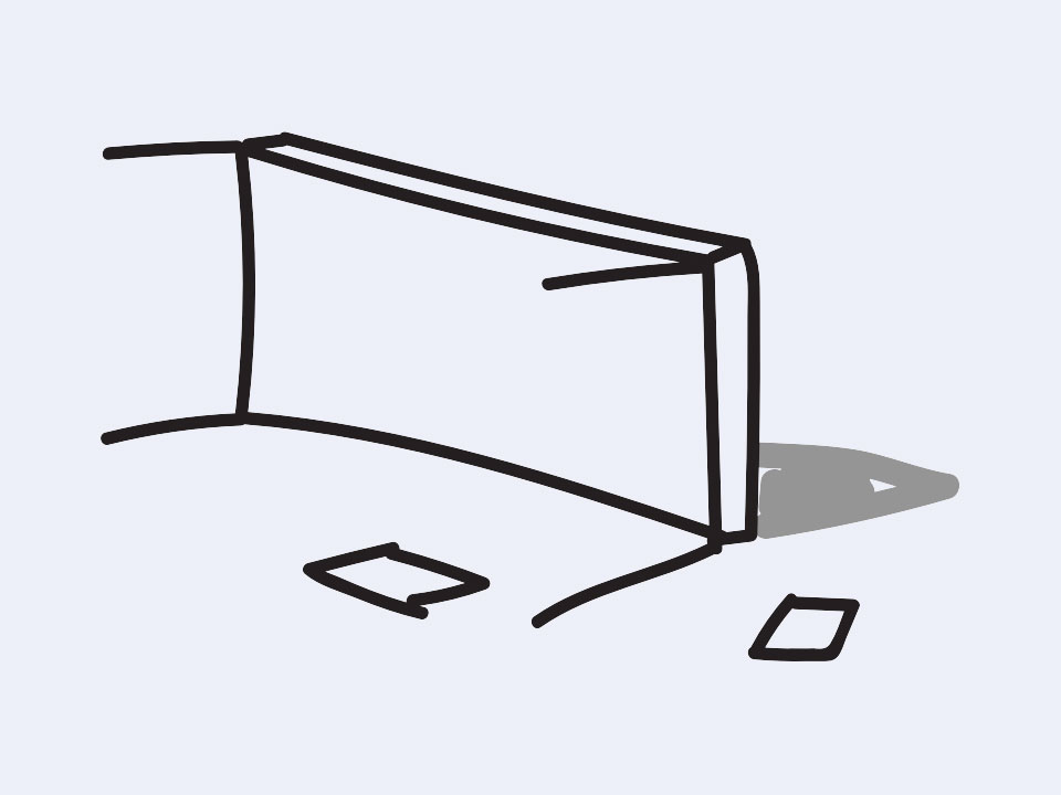 A picture of a table on its side with some papers on the floor next to it.