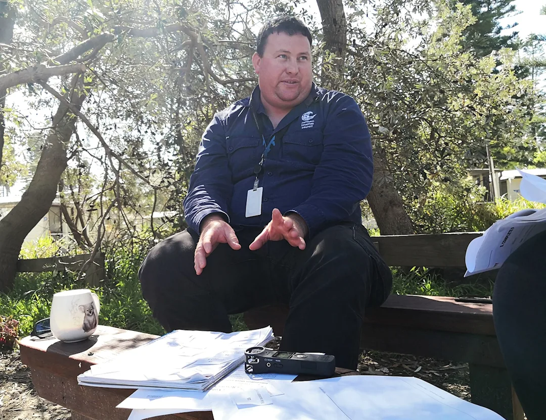 A CVA conservation worker being interviewed
