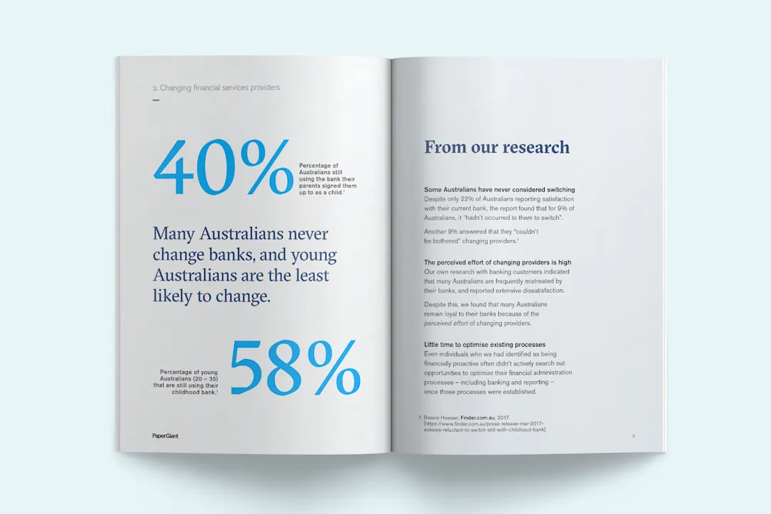 Photo of printed research report about changing financial providers. A book is open, one page highlights key statistics of customers while the other includes a research summary.