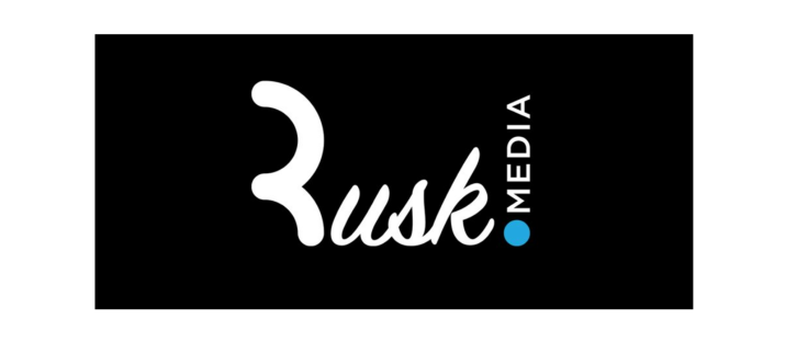 Rusk Media logo displayed on a white background. logo