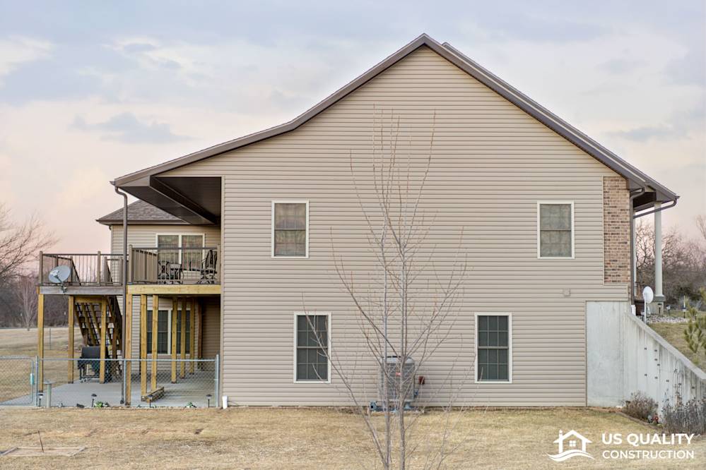 Vinyl Siding, Trim, Soffit & Gutters