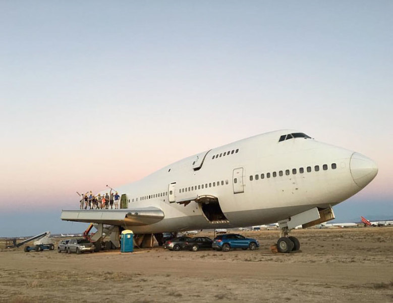 A salvaged 747 in the desert.