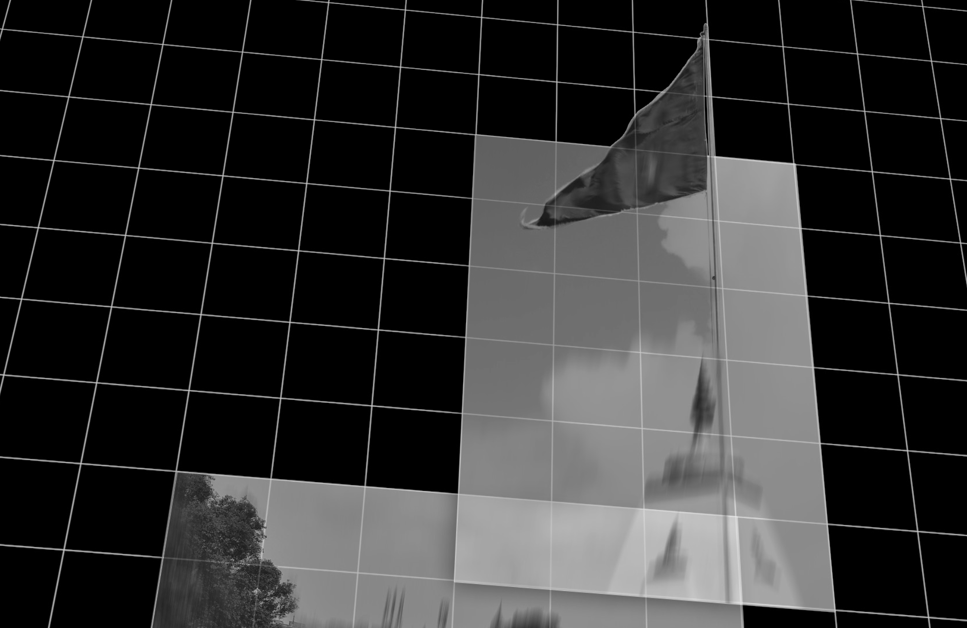 A flag raised over a building, against a black and white abstract grid