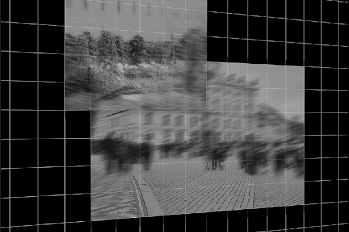 Blurred image of a civic plaza and a park, on a gridded background