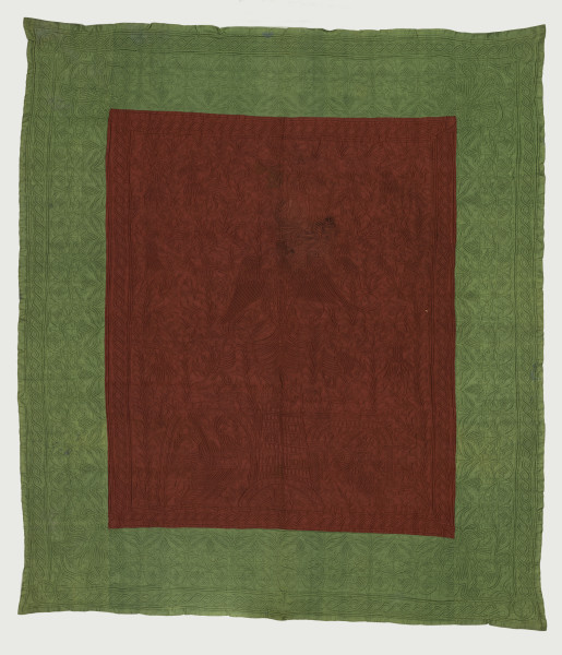 Red and green textile with embroidery