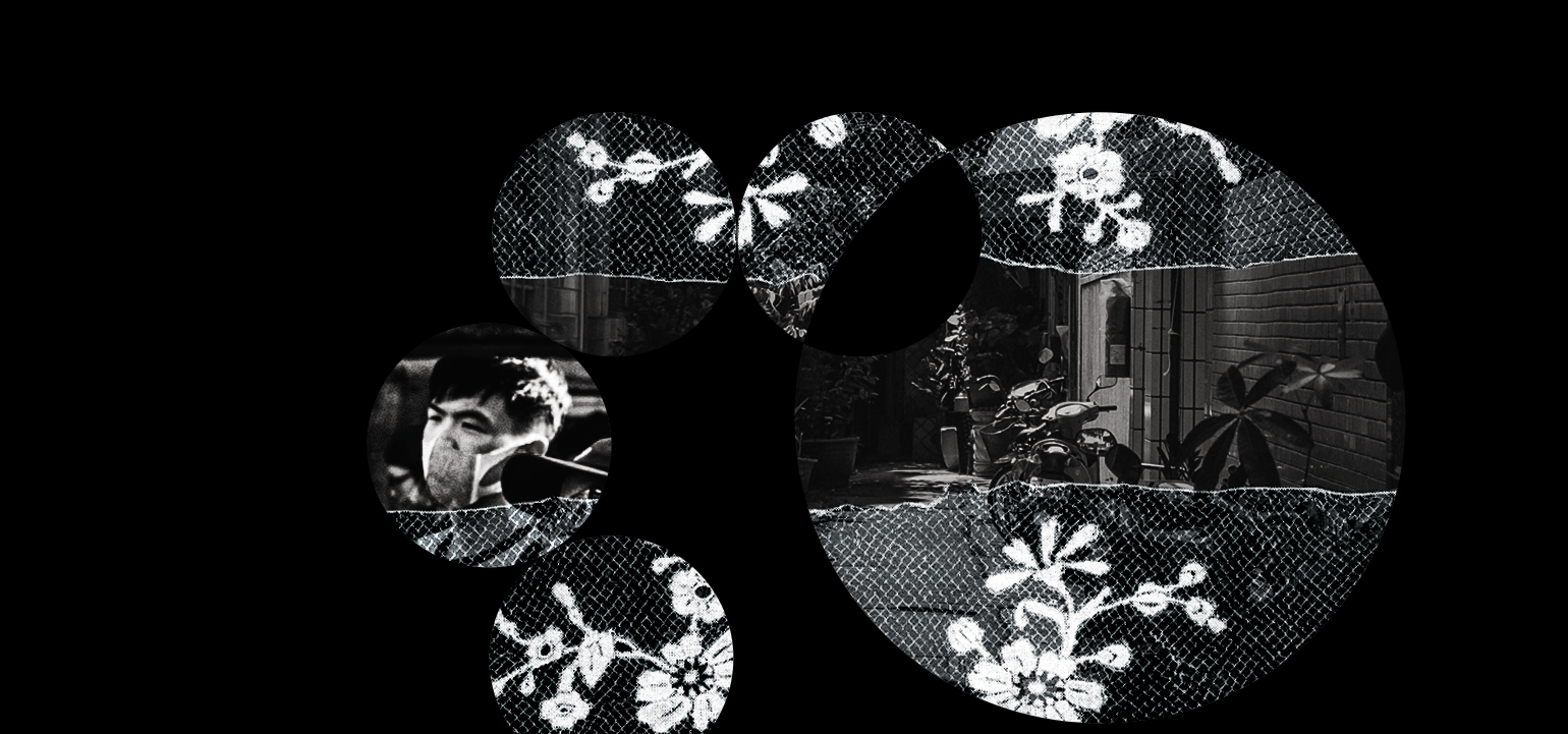 A face with a mask, behind lace