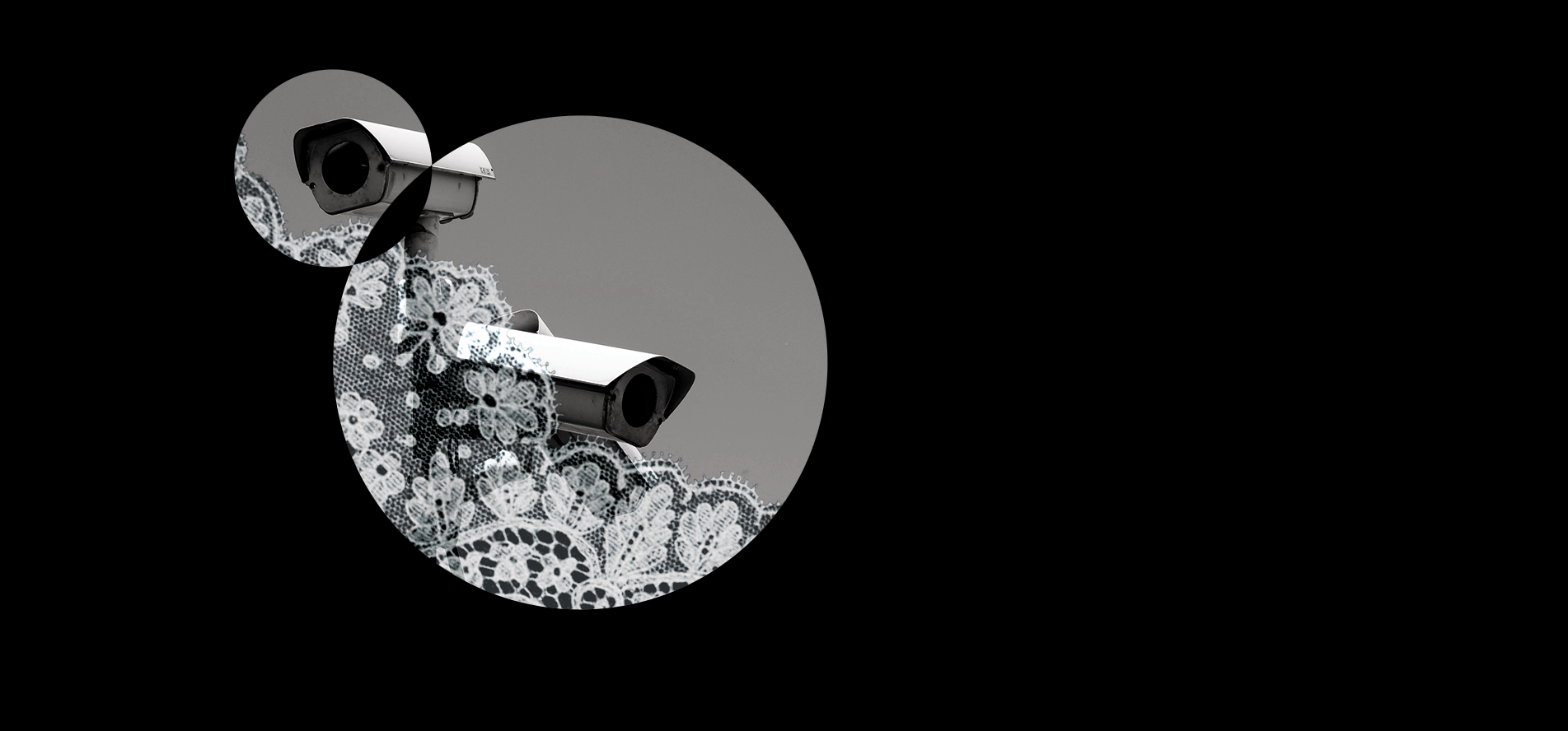Surveillance cameras behind lace on a black background.
