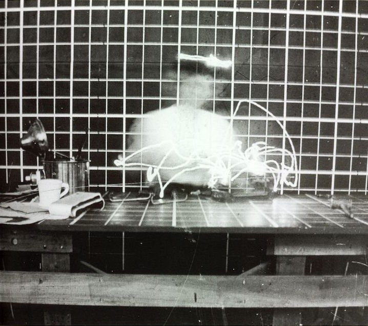 A photograph of a person working. 