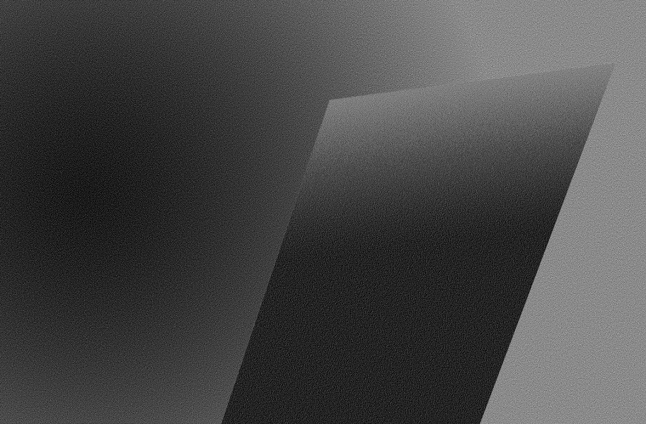 An abstract image of a greyscale gradient parallelogram on top of a greyscale gradient background.
