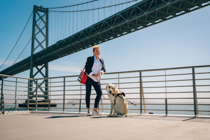 Sharon and her guide dog, Pilot, on a ferry across the San Francisco Bay.