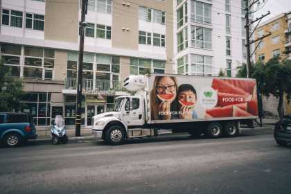 SF-Marin Food Bank truck delivering groceries in front of Openhouse