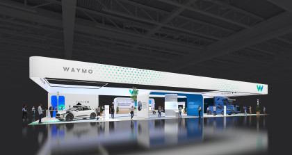 Waymo's CES booth showcasing the Jaguar I-PACE