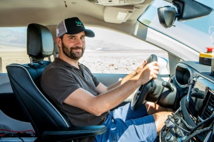 A photo of Simon Elgas in a test vehicle