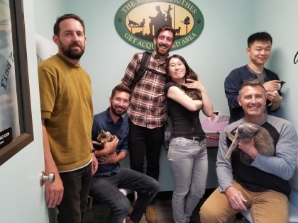 A photo of Waymonauts holding kittens