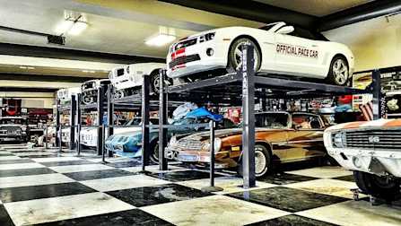 BendPak Four Post Car Lifts Multi Vehicle Storage Garage Setup