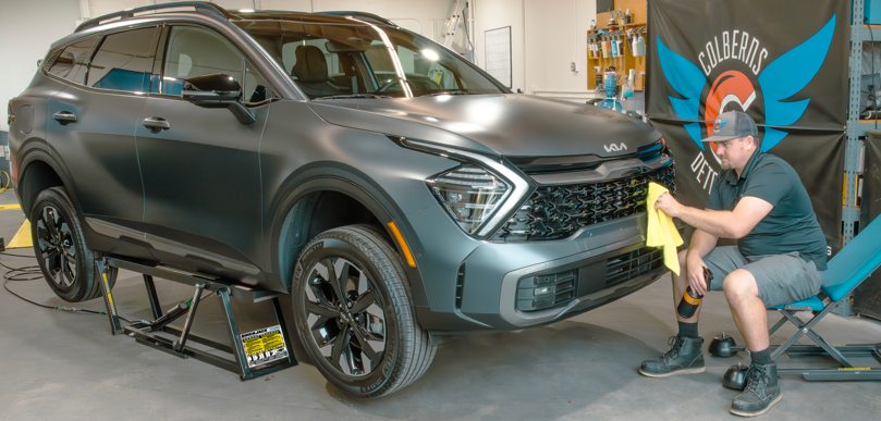 QuickJack Portable Car Lift Detailing SUV in Garage