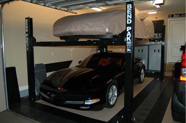 BendPak Four-Post Storage Lift in Home Garage