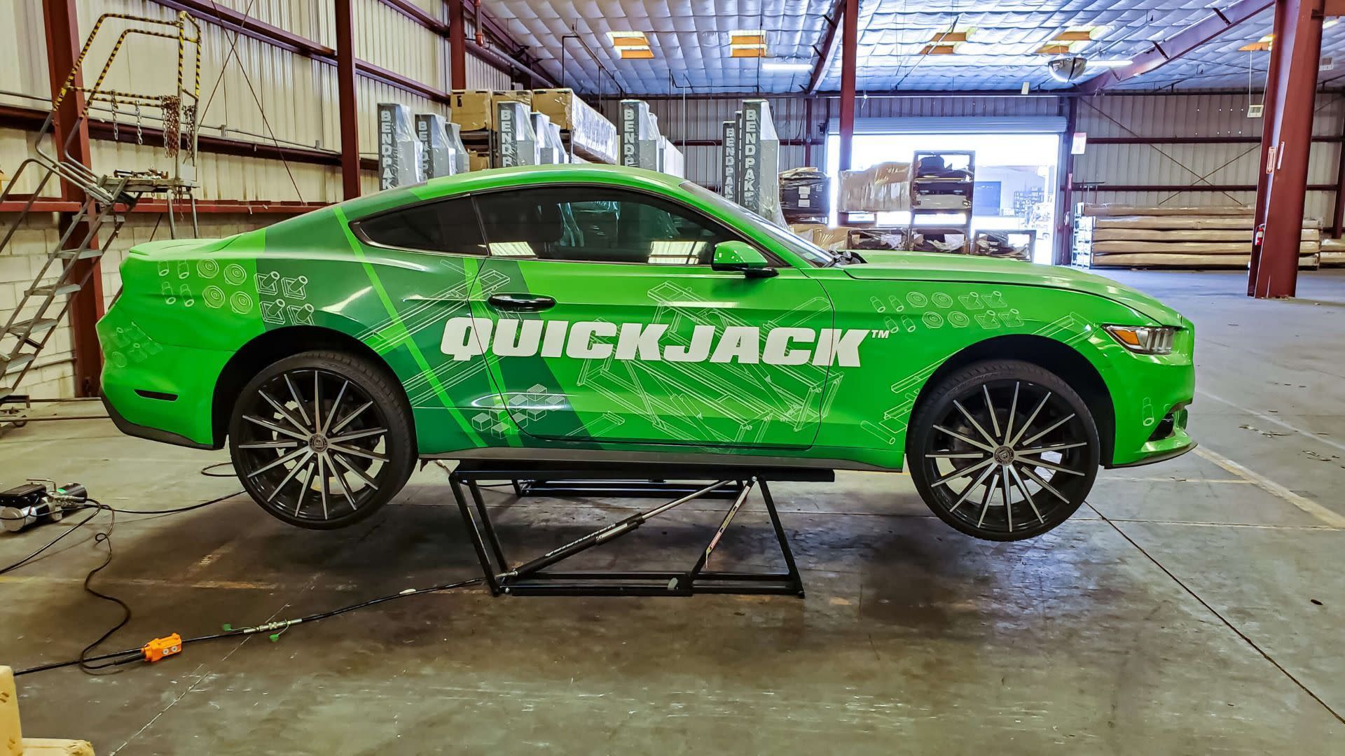 QuickJack Portable Car Lift Green Branded Vehicle