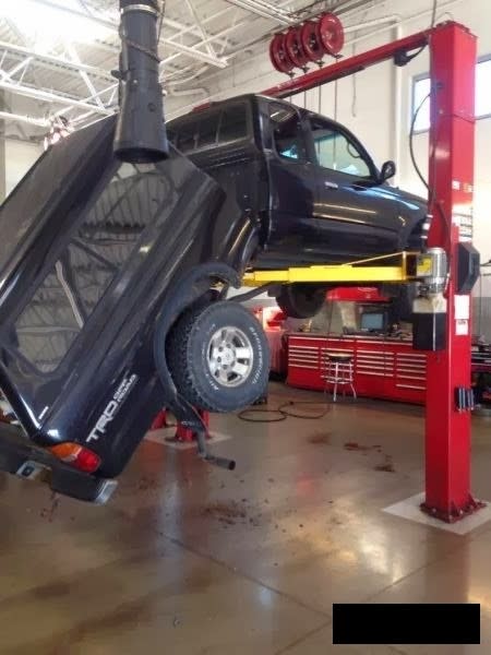 Vehicle Falling Off Two Post Lift From Improper Positioning