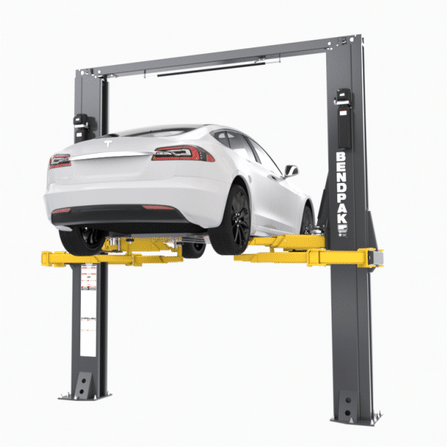 BendPak OctaFlex Two Post Lift Raising Tesla EV in Auto Shop