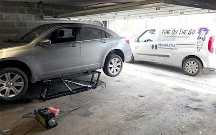 QuickJack Portable Car Lift for Mobile Mechanic Services