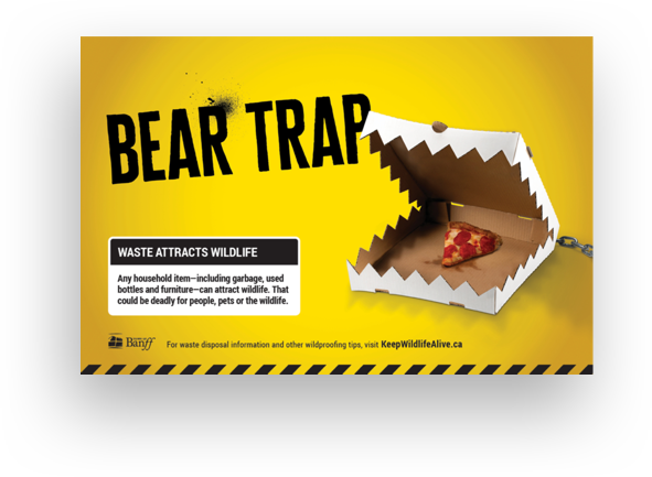 An ad from the Keep Wildlife Alive campaign we created for the Town of Banff. The ad shows a slice of pizza in a box with serrated edges alongside the tagline "Bear trap."