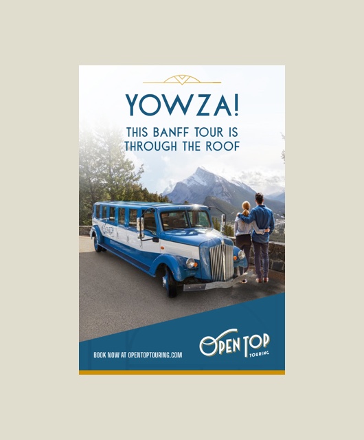 A poster for Open-Top tours shows a couple standing beside the vintage touring vehicle while admiring the mountain scenery.