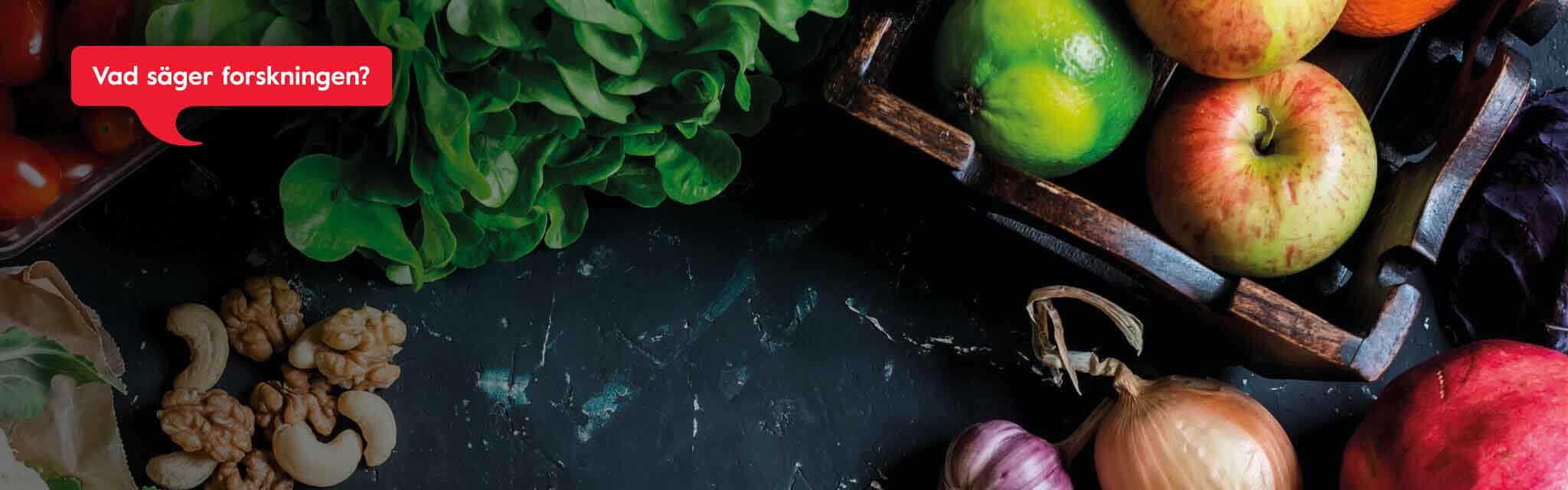 Frukt och grönsaker på ett bord