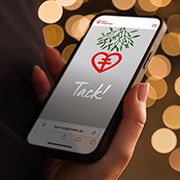 Mobiltelefon med tackbudskap