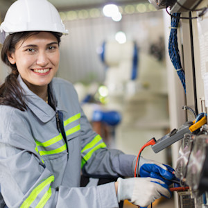 electricity engineer female working check service high voltage electrical cabinet. worker repair electric surge problem problem in industry factory.