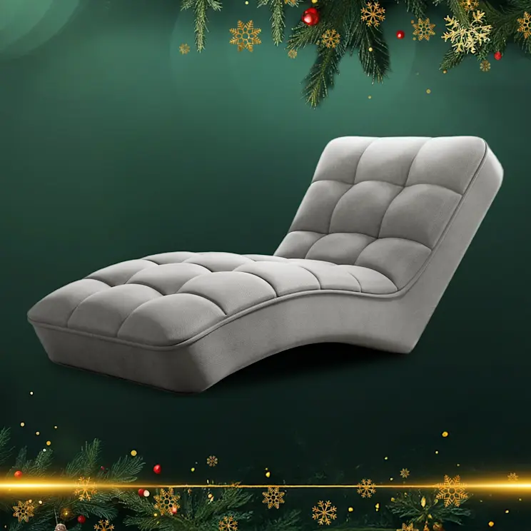 Szary szezlong Loren przedstawiony na świątecznej grafice ELTAP, z zielonym tłem, złotymi śnieżynkami i choinkowymi gałązkami.