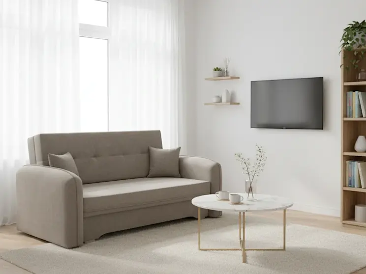 Kanapa Laine Poco 07 w jasnym, minimalistycznym salonie z delikatnymi dekoracjami, okrągłym stolikiem i miękką, naturalną kolorystyką wnętrza.