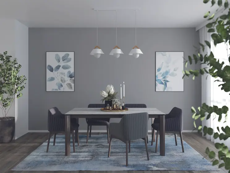 Stylowa lampa Almitara zawieszona na listwie w minimalistycznej jadalni z roślinami, grafikami i dużą ilością światła dziennego.