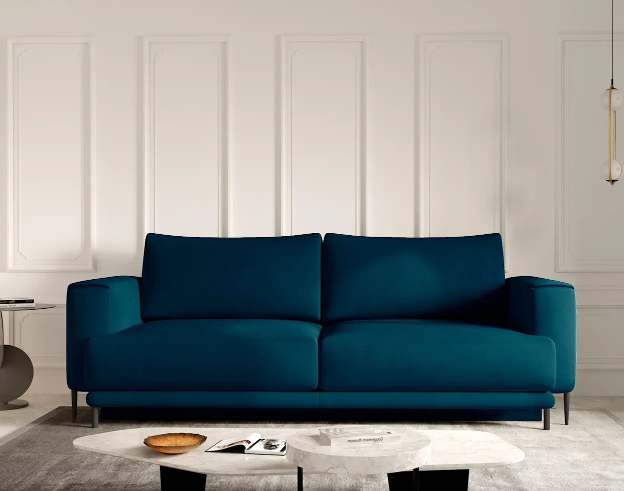 Kanapa Dalia Nube 40 w jasnym wnętrzu, z poduszkami i szerokim siedziskiem, idealna do salonu w nowoczesnym stylu.