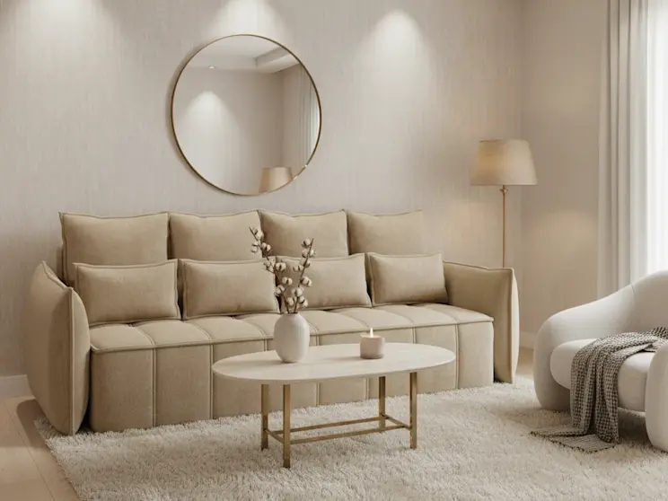 Beżowa kanapa Weltton w tkaninie Nube 20, zaprezentowana w eleganckim salonie z jasnym dywanem, stolikiem kawowym i nastrojowym oświetleniem.