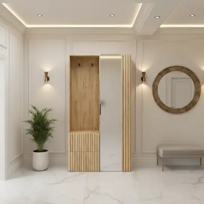 Elegancki przedpokój z garderobą Vimerio w dekorze drewna i lamelach, z dużym lustrem oraz panelem z wieszakami. Jasne ściany z dekoracyjnymi listwami, kinkiety i roślina tworzą uporządkowaną, reprezentacyjną strefę wejściową.