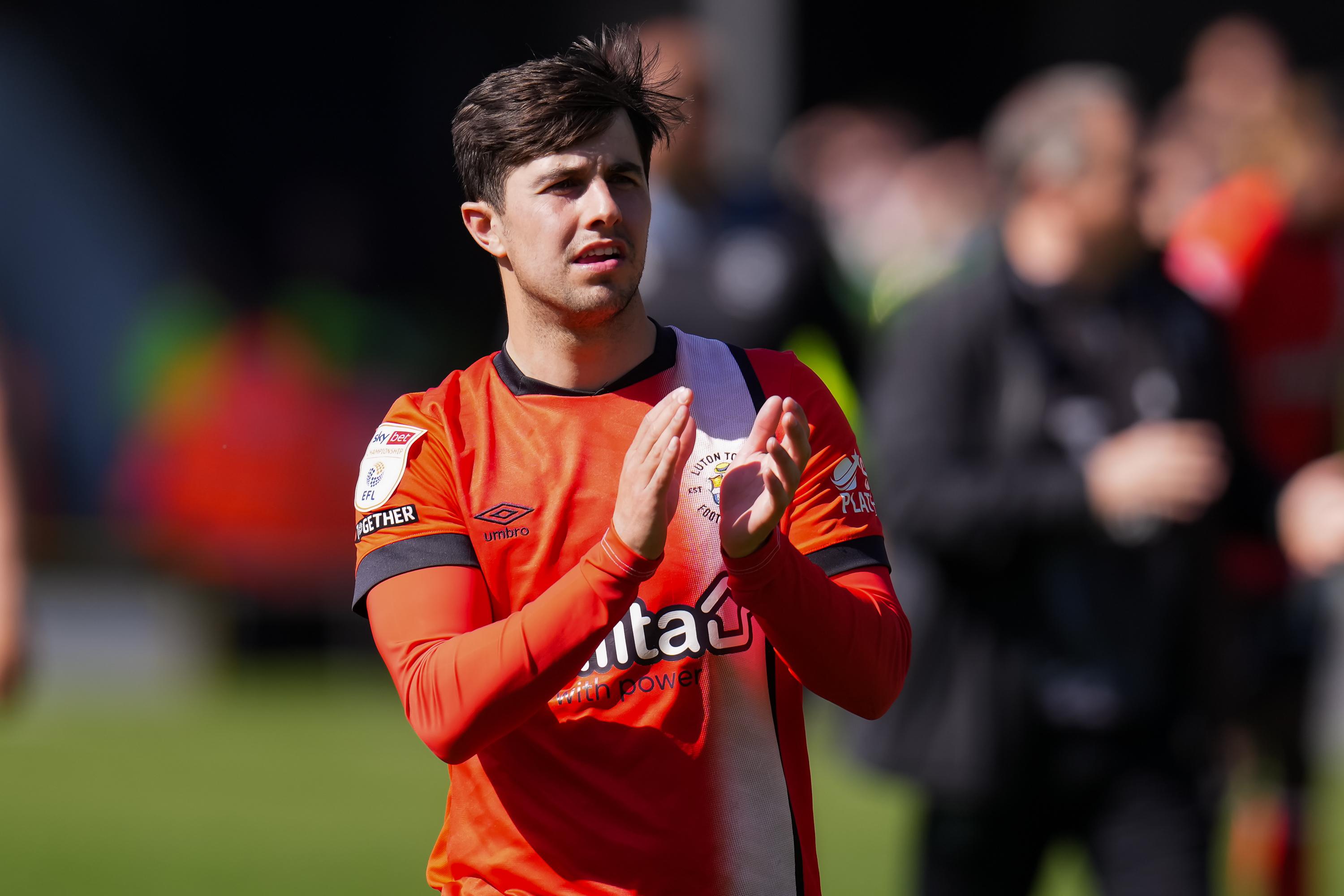 Liam Walsh applauds the fans at the end of the 1-1 draw with Leeds at Kenilworth Road.