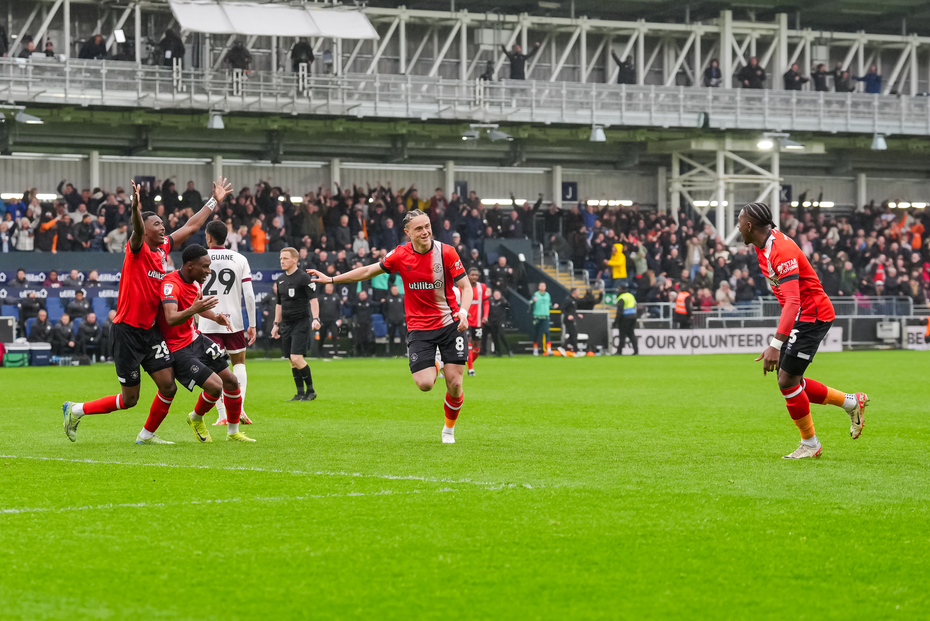 Thelo Aasgaard runs away in celebration of his opening goal against Bristol City