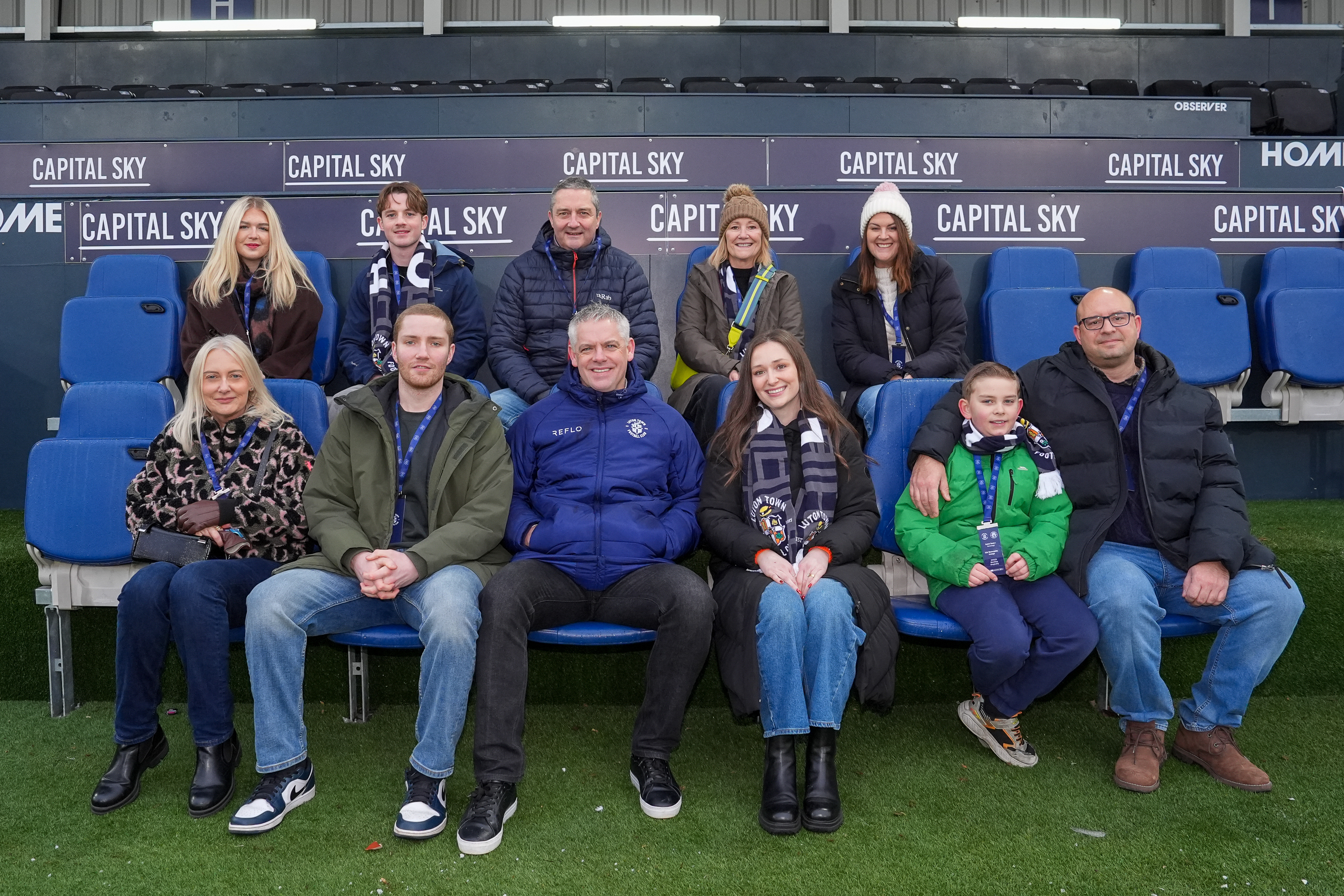 Supporters in the dugout