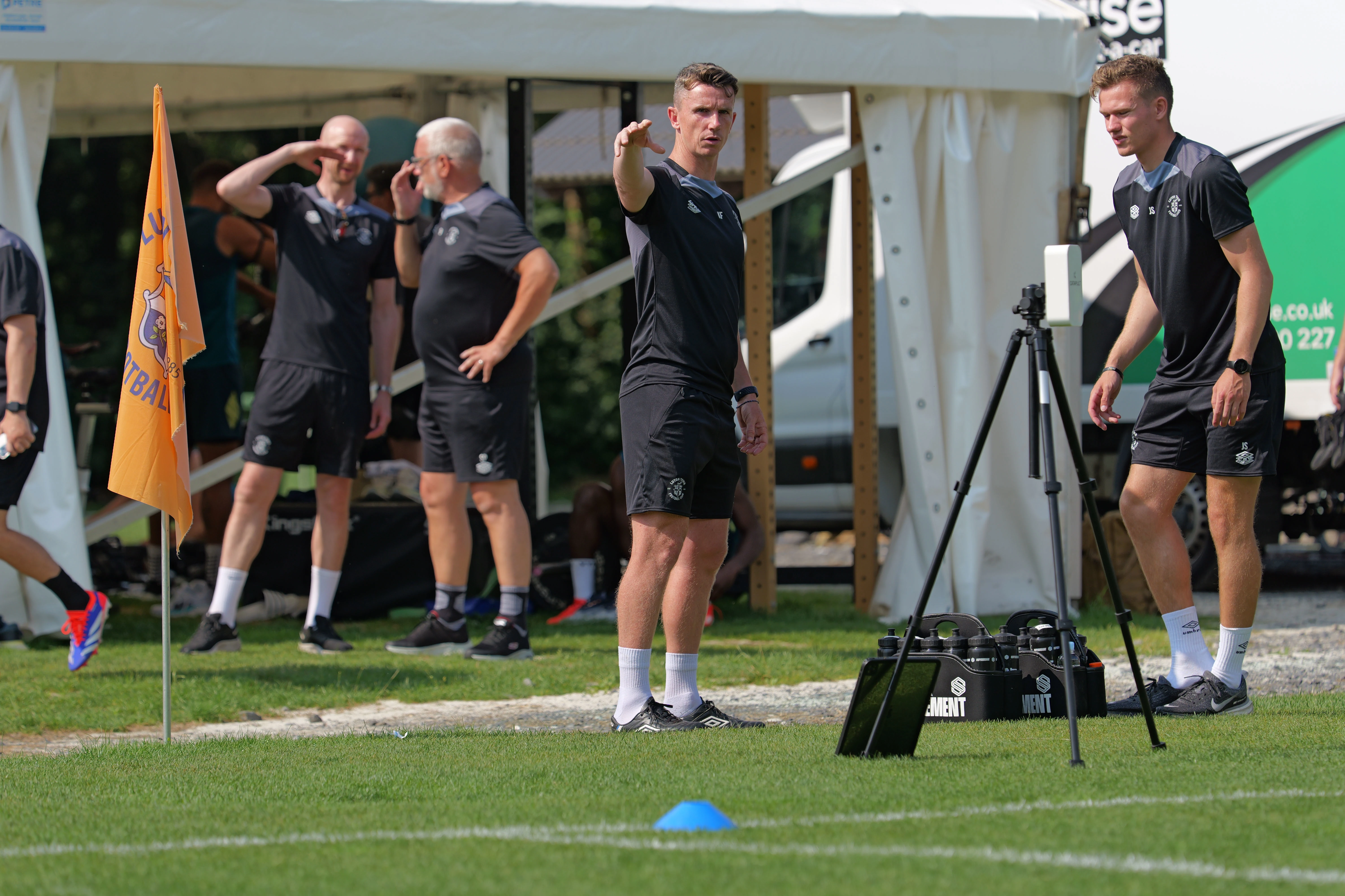 Kevin Foley directs a coaching session during the pre-season training camp in Slovenia