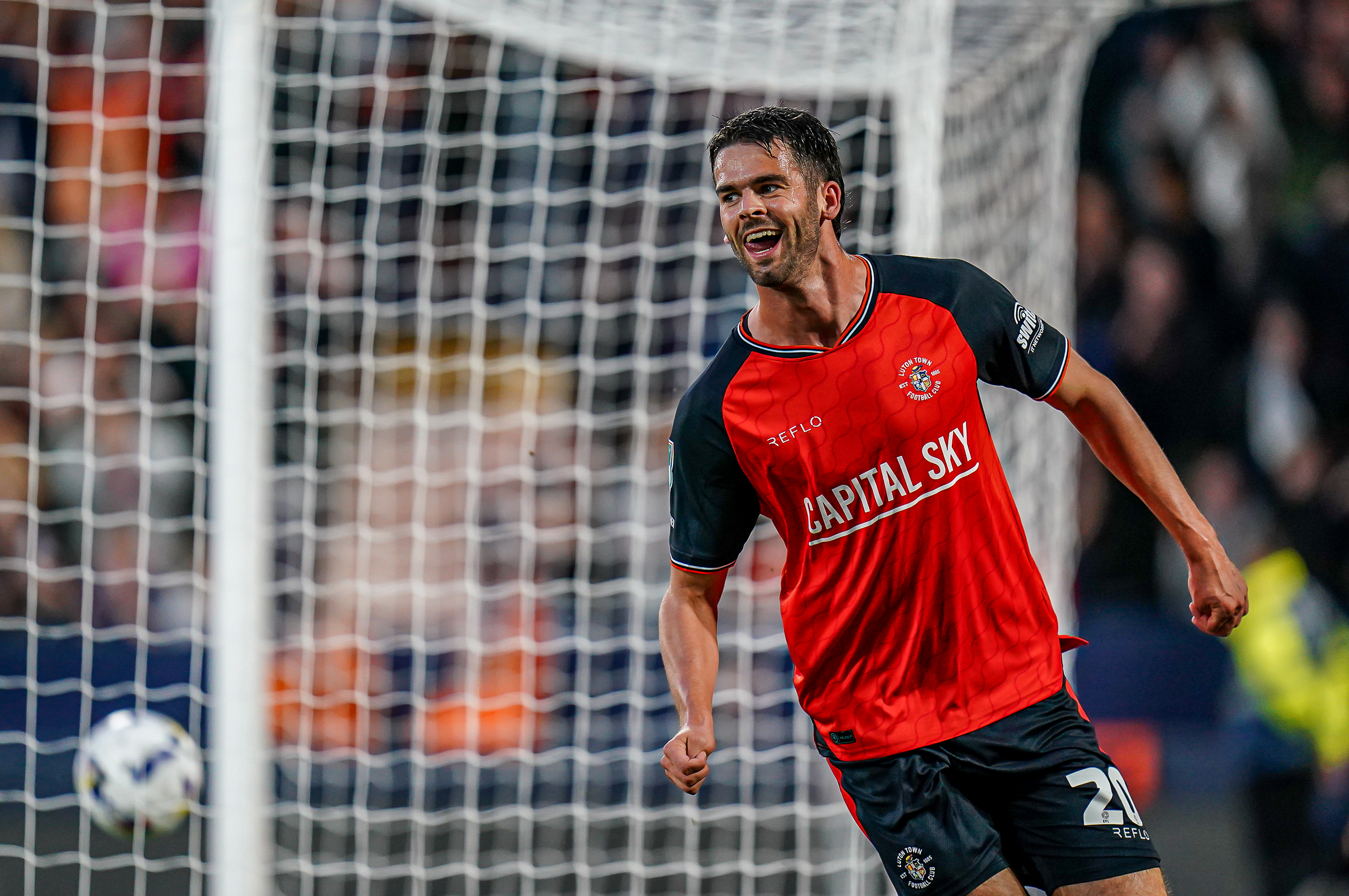 Lasse Nordas celebrates his goal in the Vertu Trophy against Barnet.