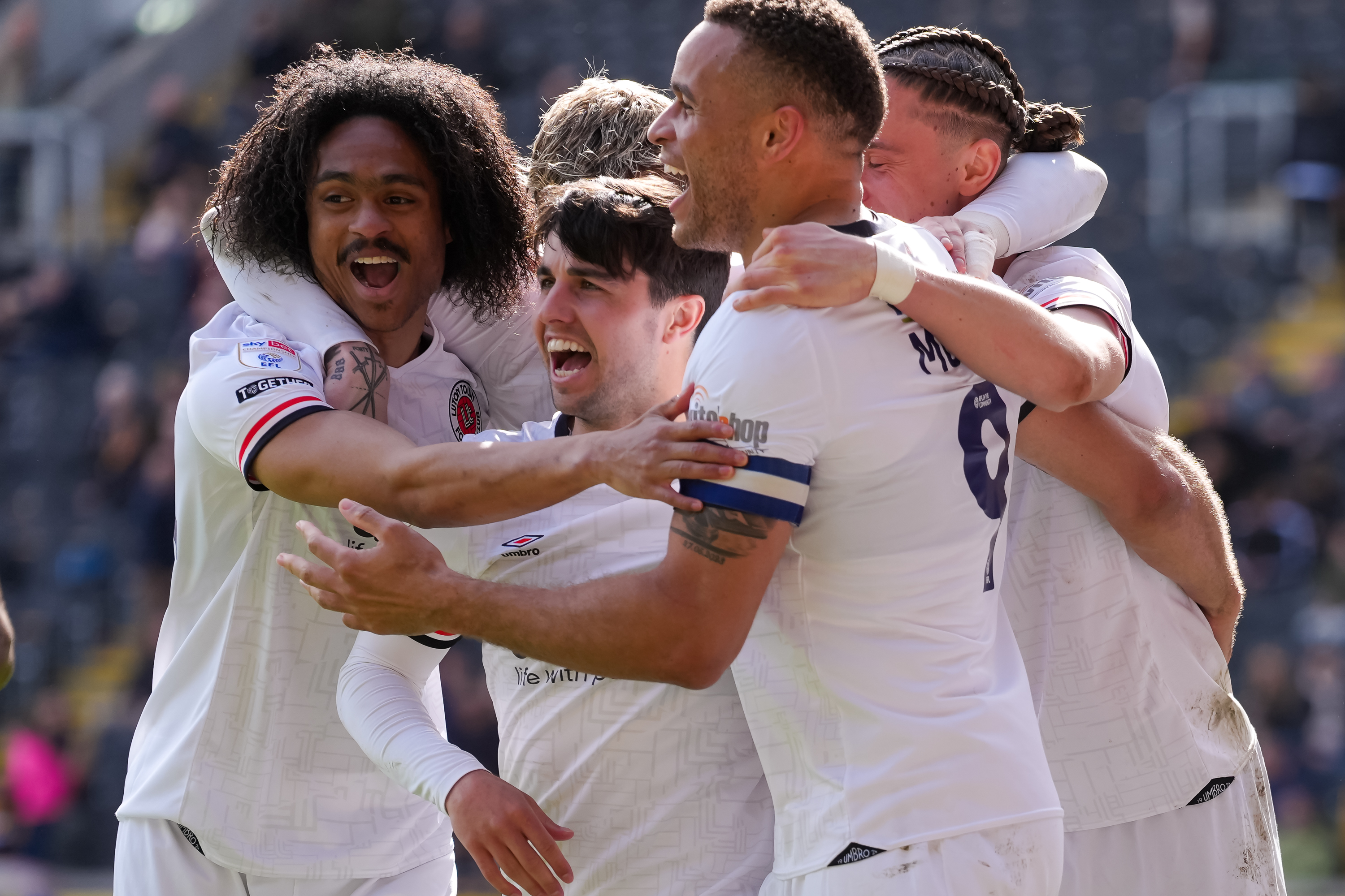 Tahith Chong, far left, joins in the celebrations of what proved to be the winning goal 13 seconds after he'd come on at Hull City.