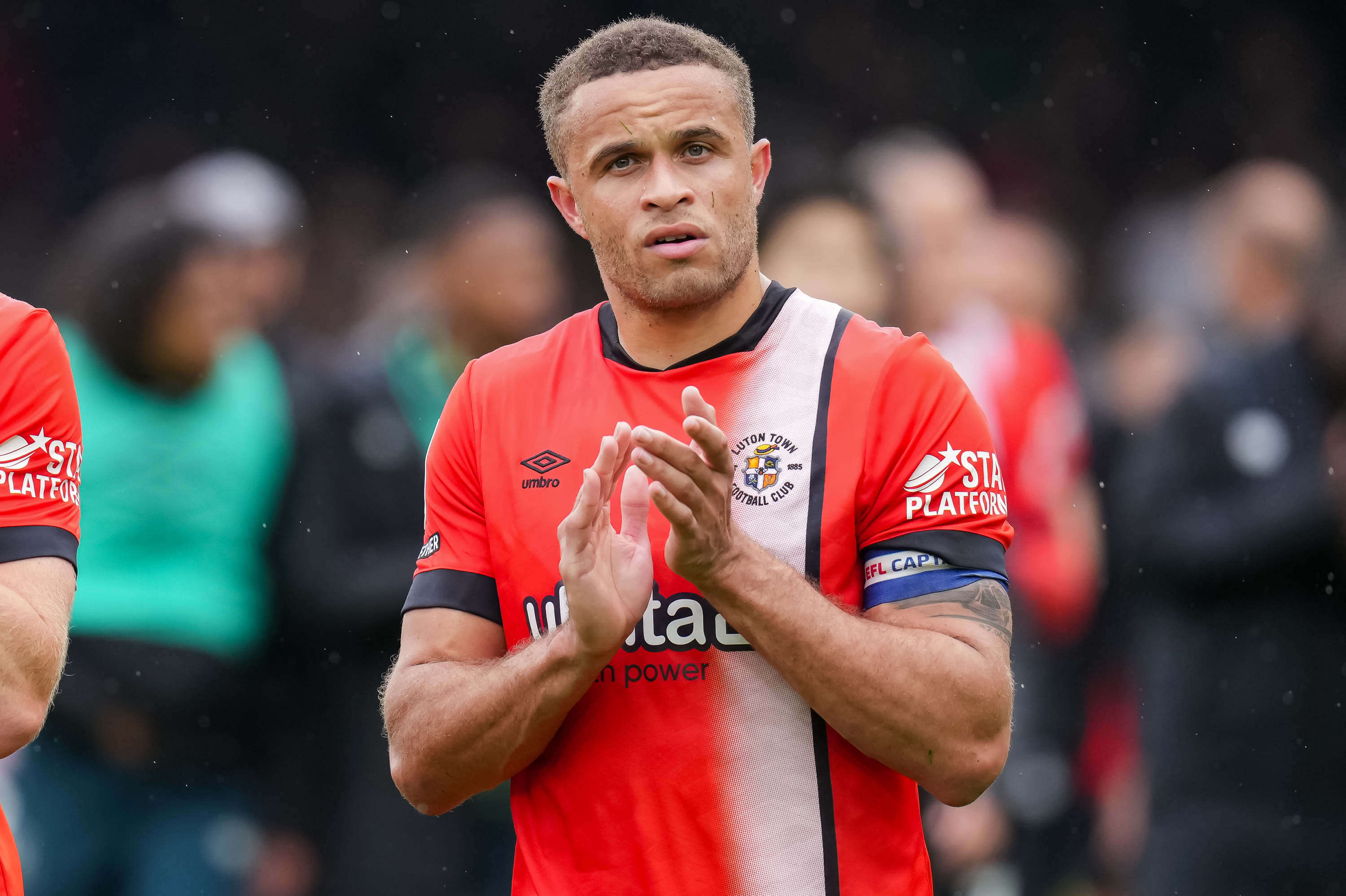 Carlton Morris applauds the Hatters supporters after the 3-1 win over Bristol City at kenilworth Road.