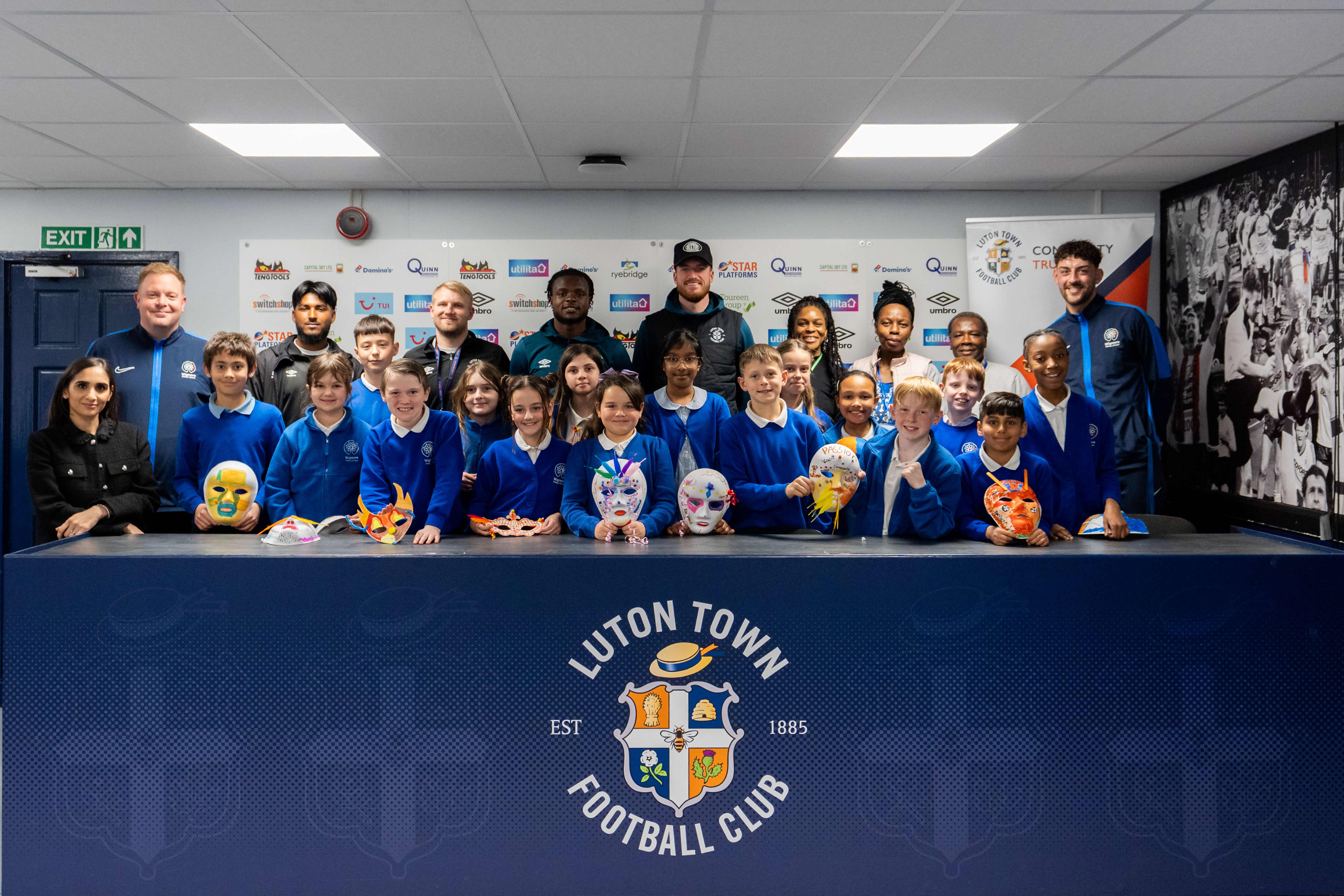 Milli Alli and Reece Burke attend a poetry session run by the Luton Town Community Trust in conjunction with the National Literacy Trust.